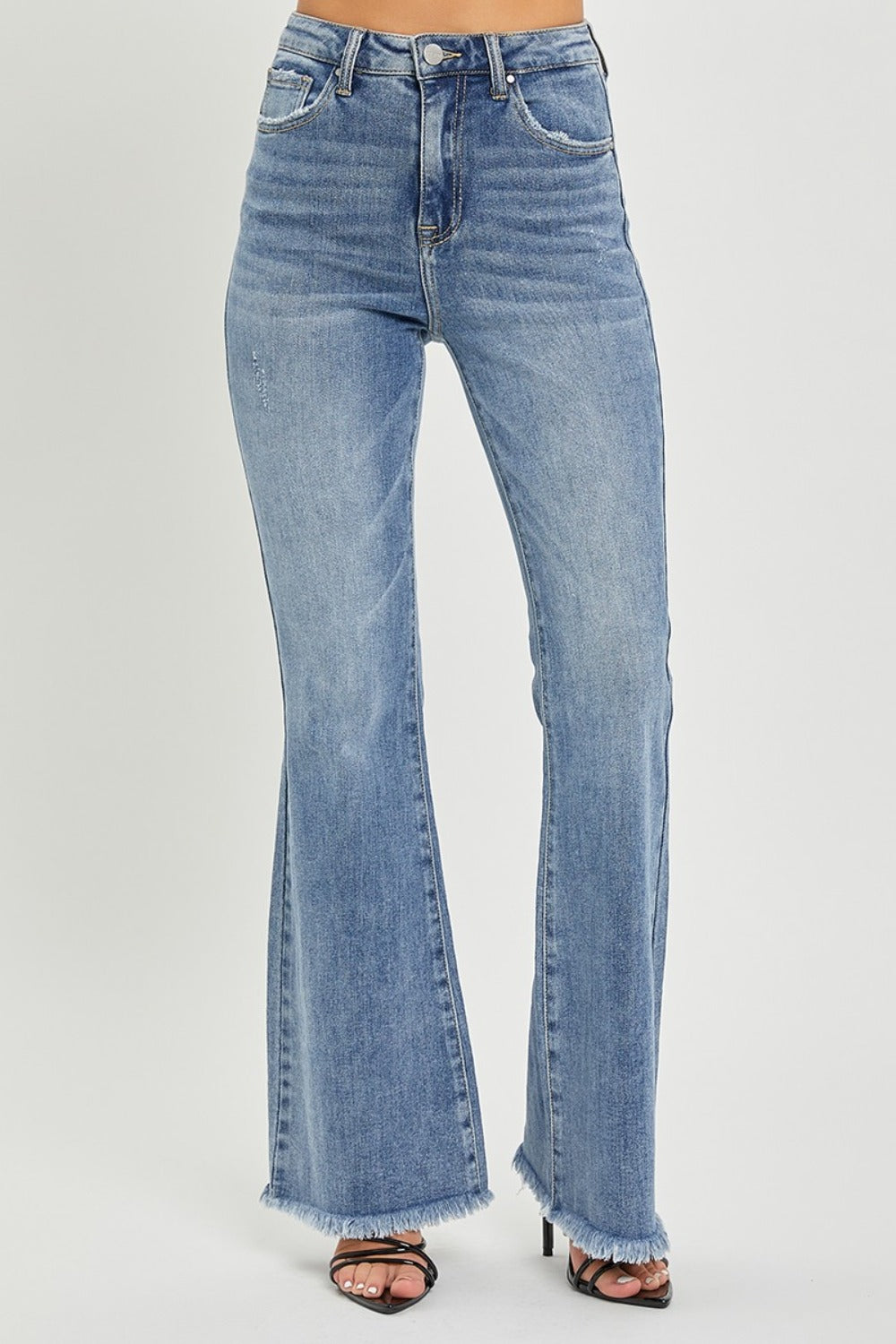 Untamed Raw Hem High Rise Flare Jeans in Medium Wash