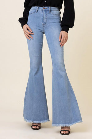 Free Spirit Raw Hem High Rise Flare Jeans in Light Stone Wash