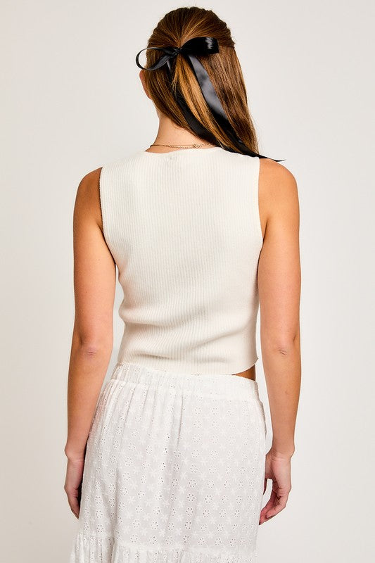 Marisol Bow Detail Sleeveless Knit Top in Black, Cream, Light Pink, & Red