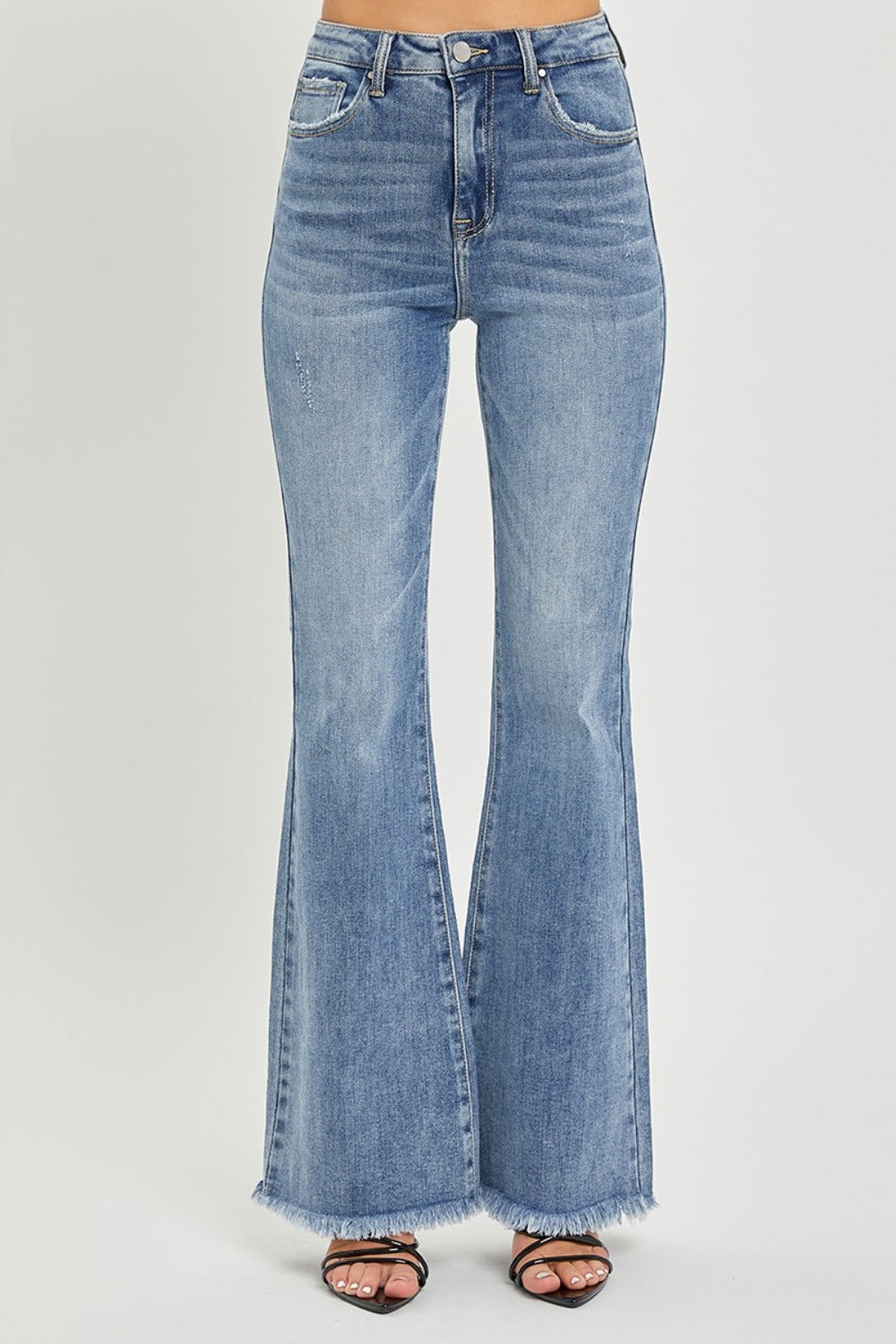 Untamed Raw Hem High Rise Flare Jeans in Medium Wash