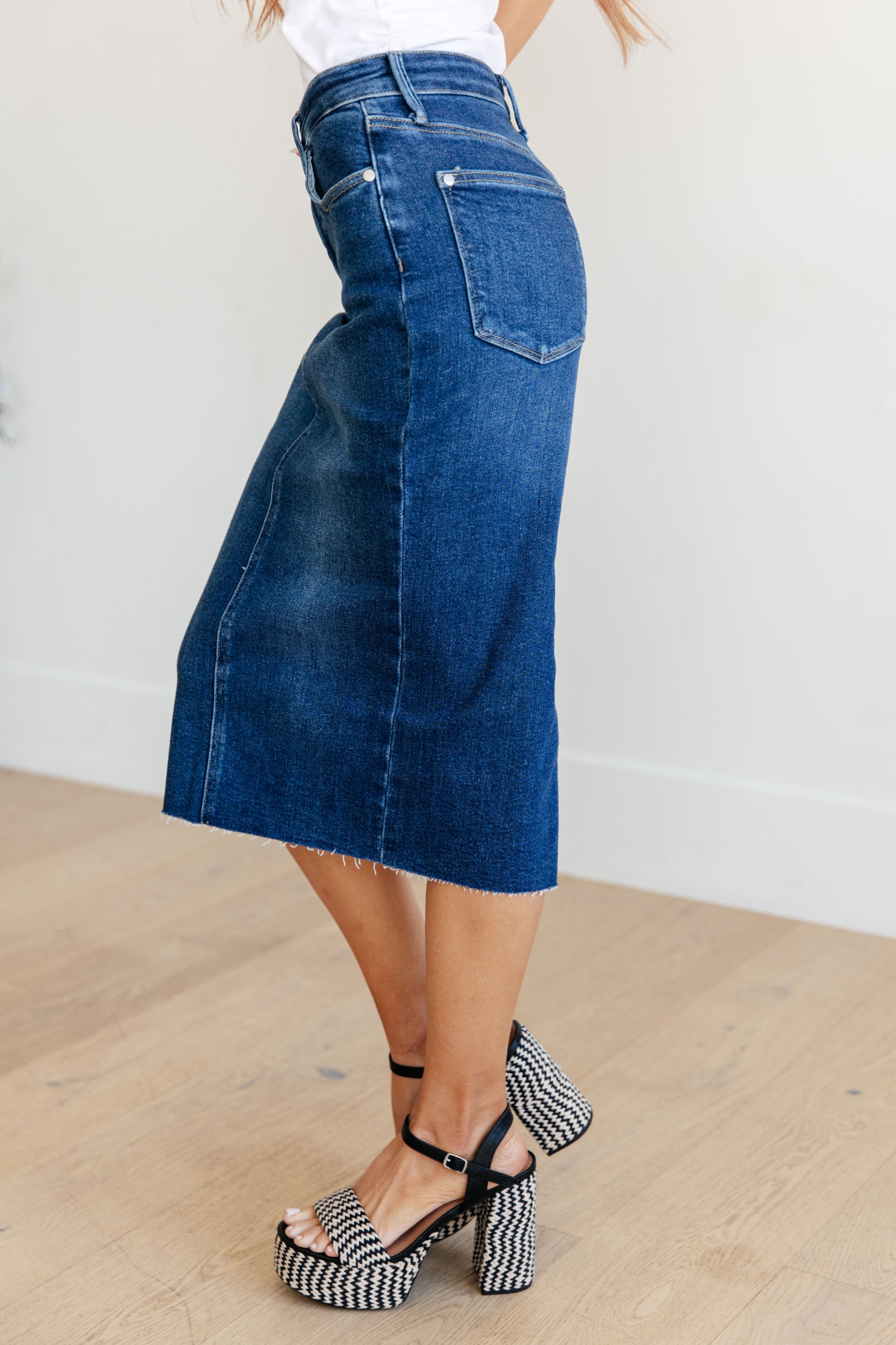 Aleska High Rise Denim Midi Skirt in Dark Wash