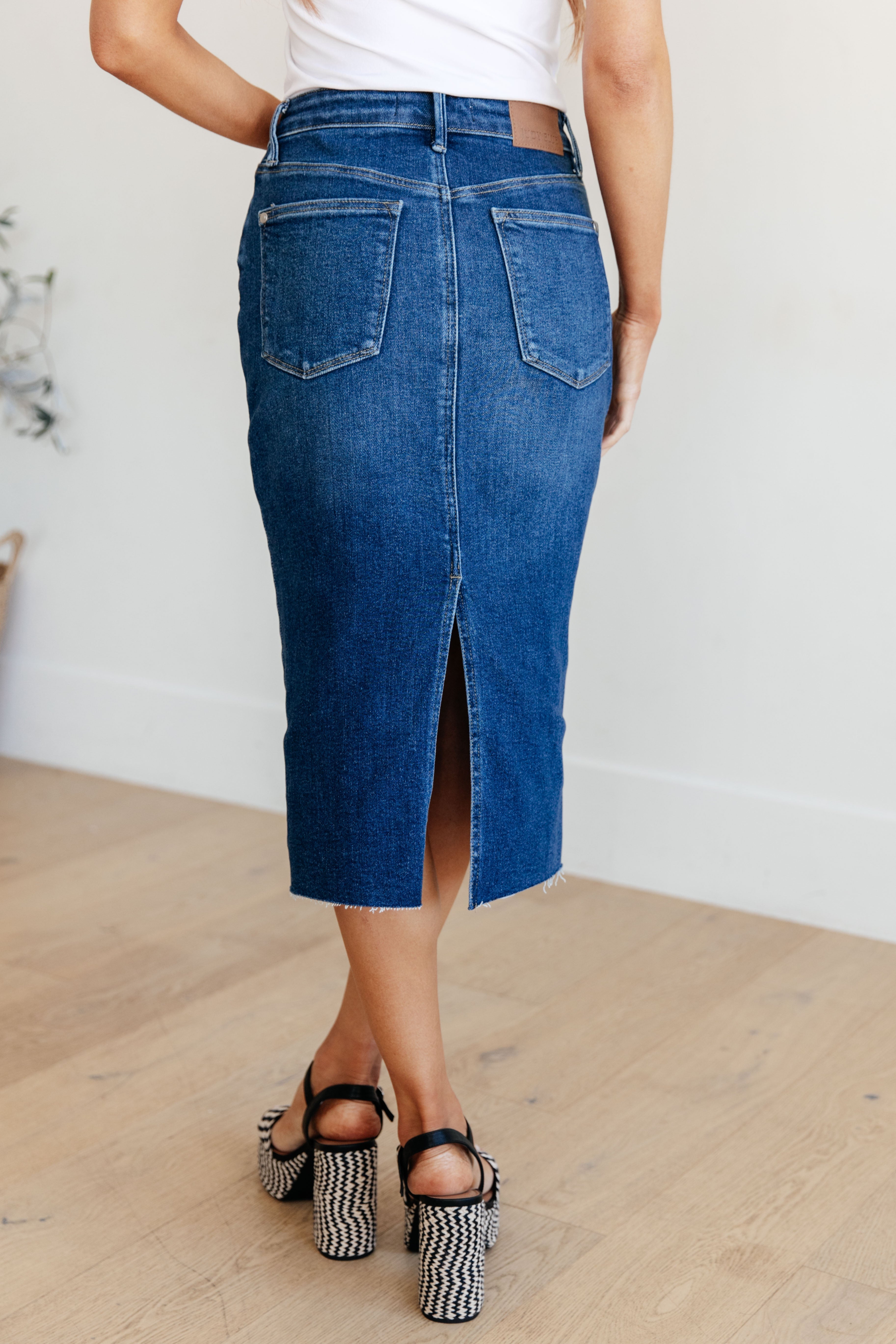 Aleska High Rise Denim Midi Skirt in Dark Wash