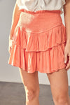 Tiana Smocked, Ruffled Mini Skirt with Shorts in Coral Haze