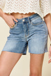 Delia Raw Hem Denim Shorts in Medium Wash