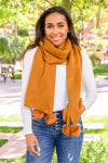 What's the Fuzz Knitted Pom Pom Scarf In Ginger