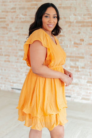 Flit & Flutter Sleeve Tiered Dress in Orange