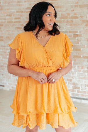 Flit & Flutter Sleeve Tiered Dress in Orange